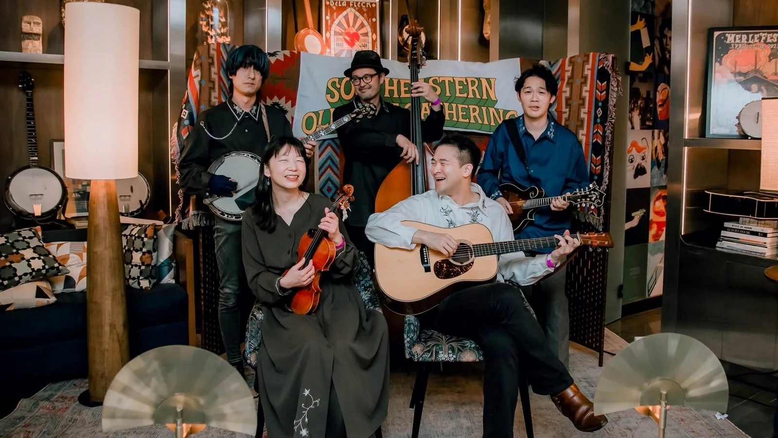 The five members of Bluegrass Police with their instruments